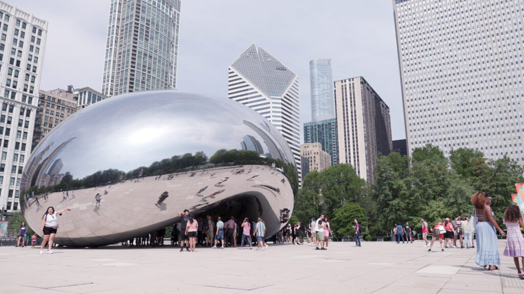 busy-summer-day-downtown-at-cloud-gate-chicago-4k-SBI-351211132